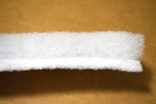 side view of polyester filter shows dense side and fluffy side
